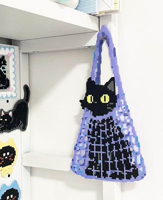 Cute bagged cat pattern made with 2.6mm mini perler beads by FusePix