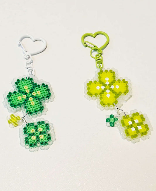 Four-leaf clover charm pattern made with 2.6mm mini perler beads by FusePix