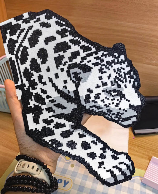 Stylized leopard pixel art pattern made with 2.6mm mini perler beads
